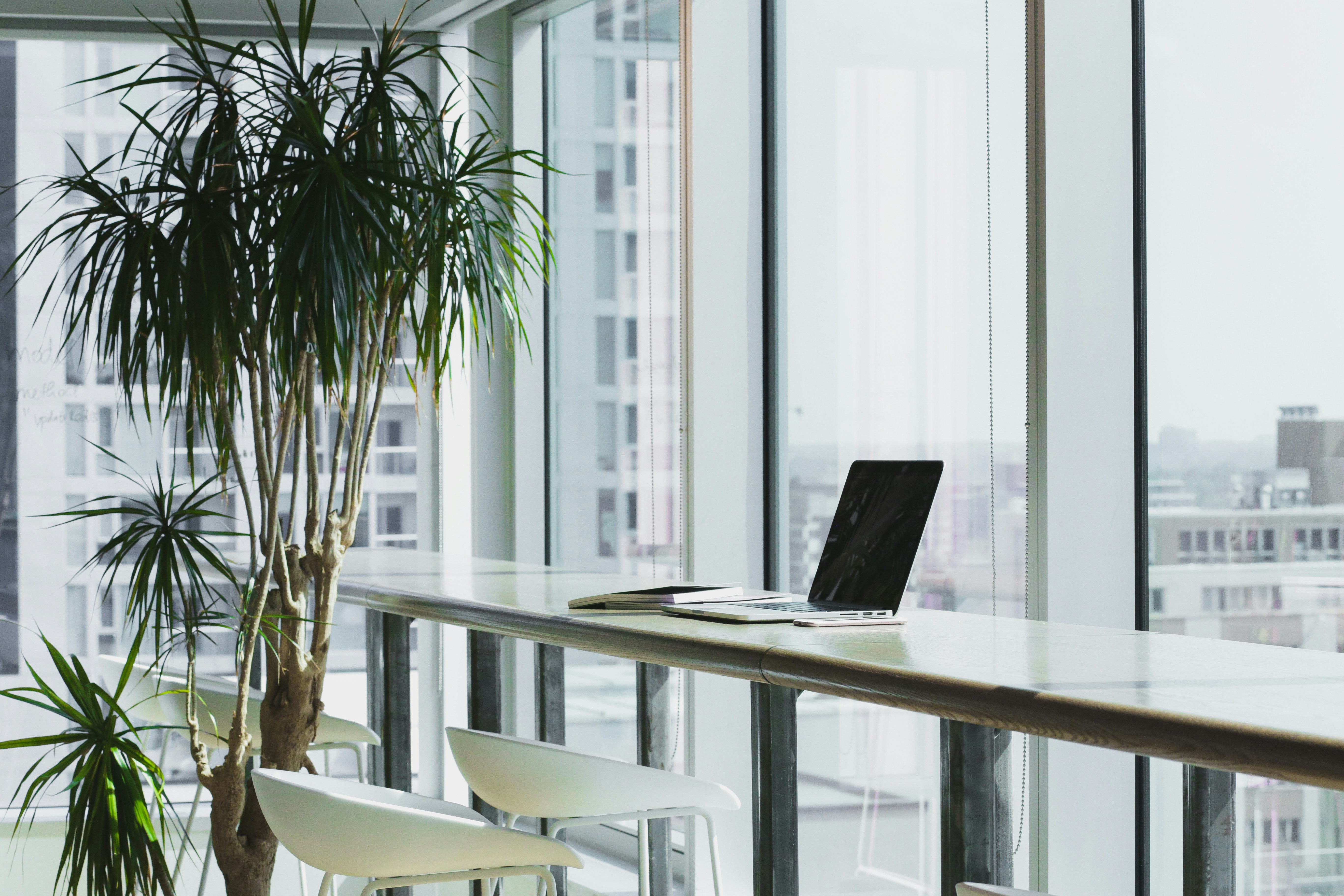 laptop on a desk in office